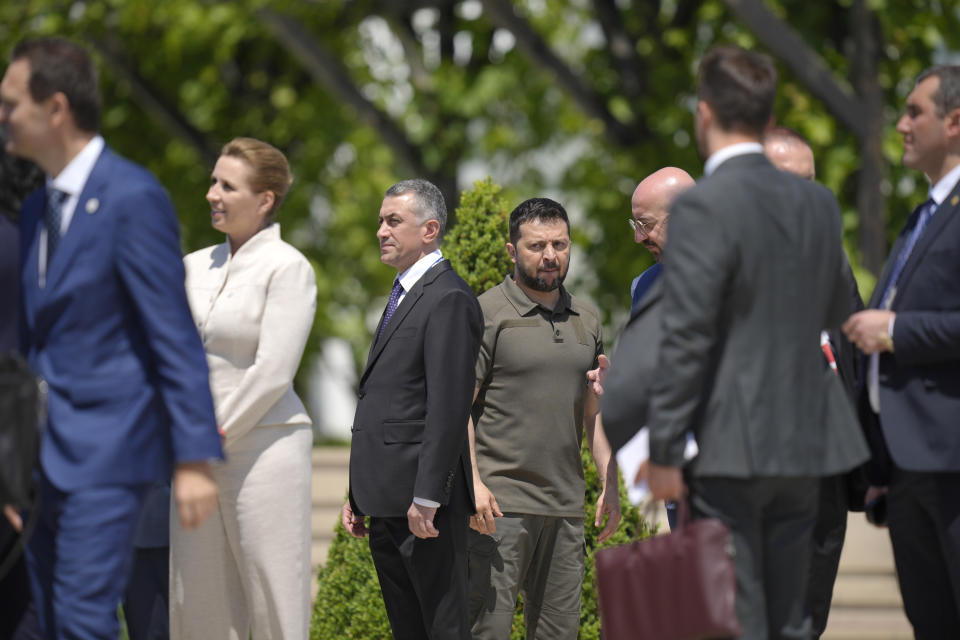 Ukraine's President Volodymyr Zelenskyy, center, speaks with European Council President Charles Michel, center right, during the European Political Community Summit at the Mimi Castle in Bulboaca, Moldova, Thursday, June 1, 2023. Leaders are meeting in Moldova Thursday for a summit aiming to show a united front in the face of Russia's war in Ukraine and underscore support for the Eastern European country's ambitions to draw closer to the West and keep Moscow at bay. (AP Photo/Vadim Ghirda)