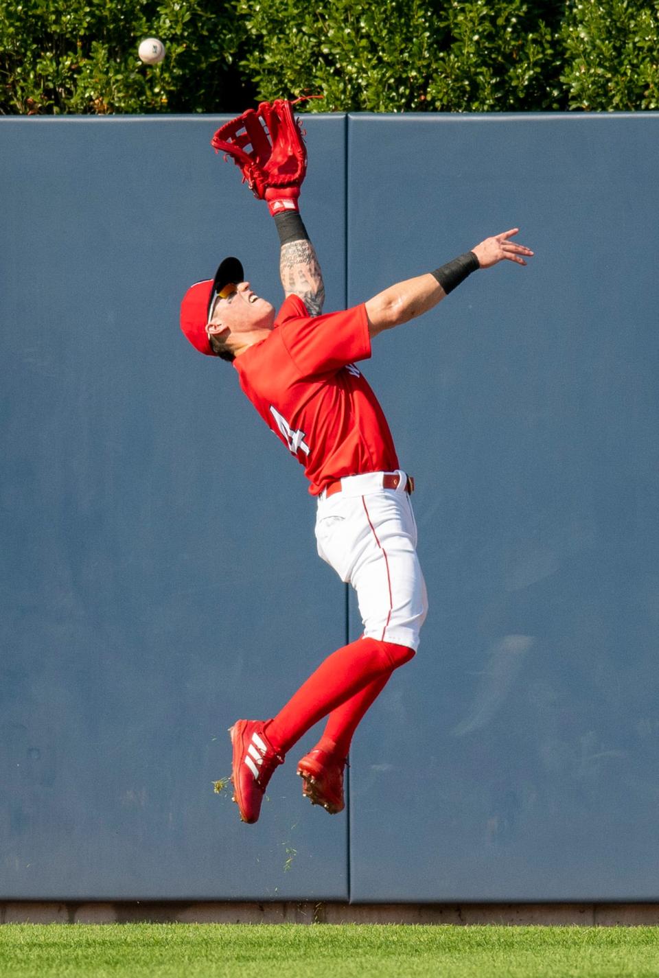 WooSox center fielder Jarren Duran leaps but does not catch a fly ball from RailRiders' Greg Bird.