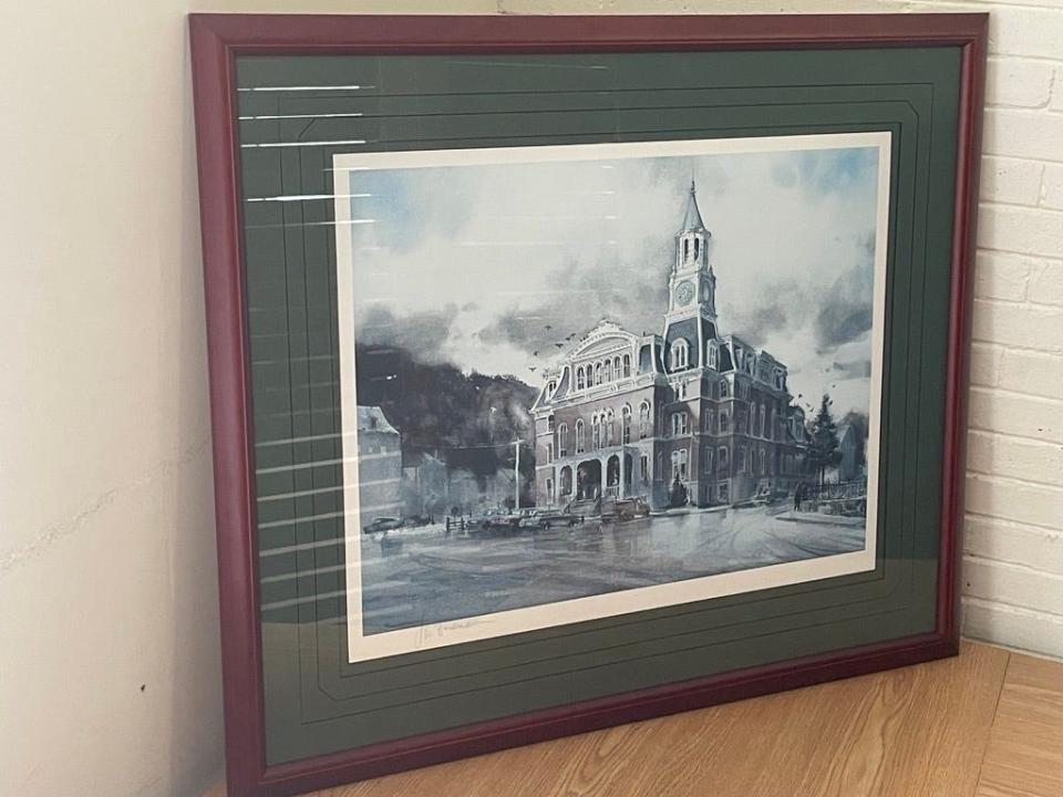 A print of a watercolor painting of Norwich City Hall, signed by artist Lou Bonamarte.