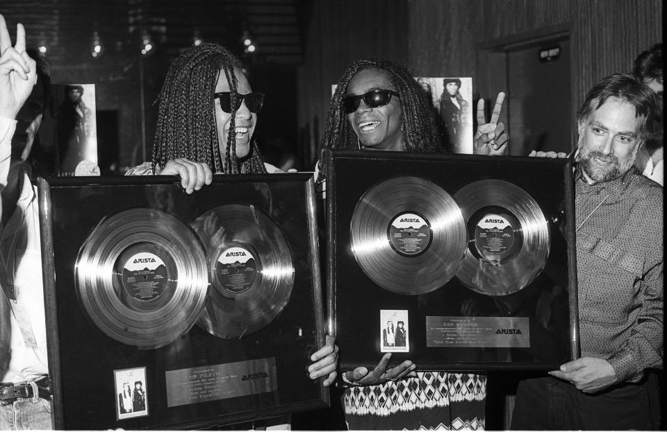 EAST RUTHERFORD, NEW JERSEY-- JULY 23:  Milli Vanilli (Fab Morvan, Rob Pilatus) are shown receiving several awards backstage when they perform as part of the Club MTV Tour at the Brendan Byrne Arena on July 23, 1989 in East Rutherford, New Jersey. (Photo by Al Pereira/Michael Ochs Archives/Getty Images)