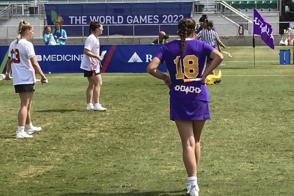 Lois Garlow (18) of the Haudenosaunee Nationals lacrosse team plays during a match against Canada at the World Games in Birmingham, Ala., July 24, 2022. Members of the Haudenosaunee are hopeful they will have a chance to play the sport their people invented when lacrosse returns to the Olympics in 2028 in Los Angeles. (AP Photo/Paul Newberry)