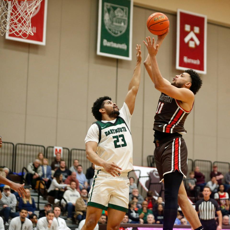 Malachi Ndur, right, shown in a March 2 game for Brown, will play for William & Mary next season.