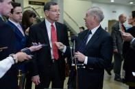 Sen. John Barrasso (R-WY) and Sen. Lindsey Graham (R-SC) hold a news conference after the Trump impeachment trial ended for the day in Washington