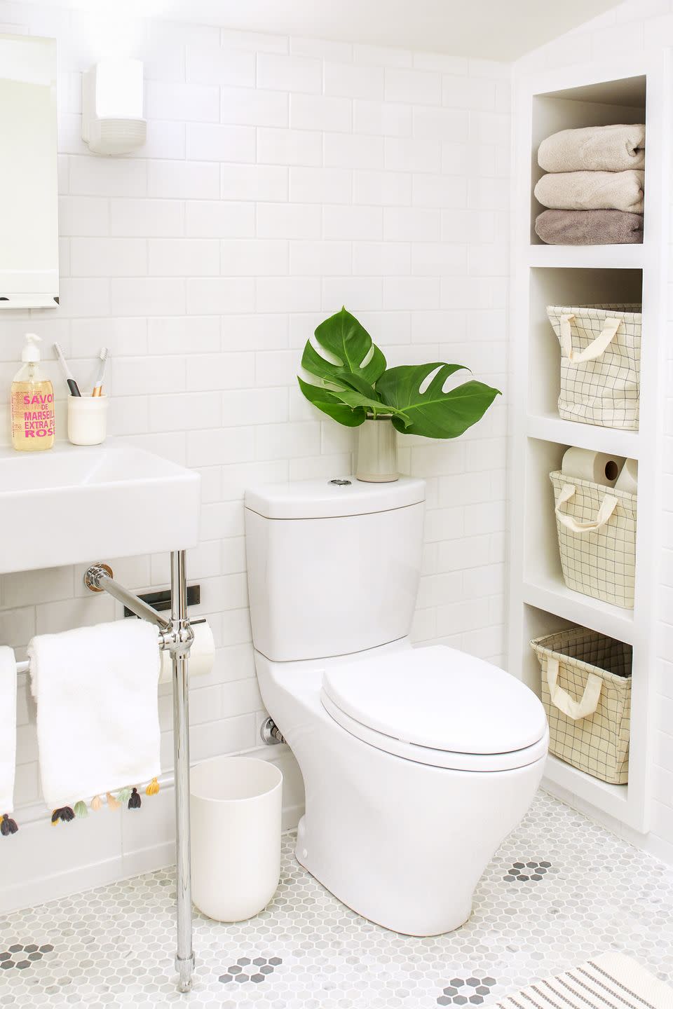 bathroom shelf ideas, white bathroom with open built in shelves next to the toilet