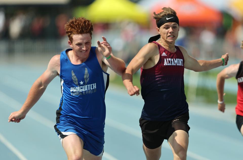 Panguitch’s Klyn Fullmer and Alamont’s Ethan Hansen jockey for position as they near the finish line as High School athletes gather at BYU in Provo to compete for the state track and field championships on Saturday, May 20, 2023. Hansen edged Fullmer for the win in the 200m race. | Scott G Winterton, Deseret News