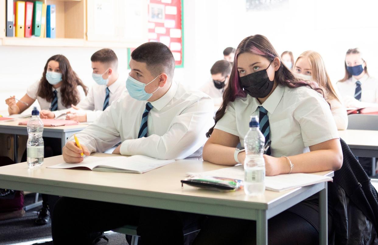 Pupils wear face masks at a school in Scotland (PA)