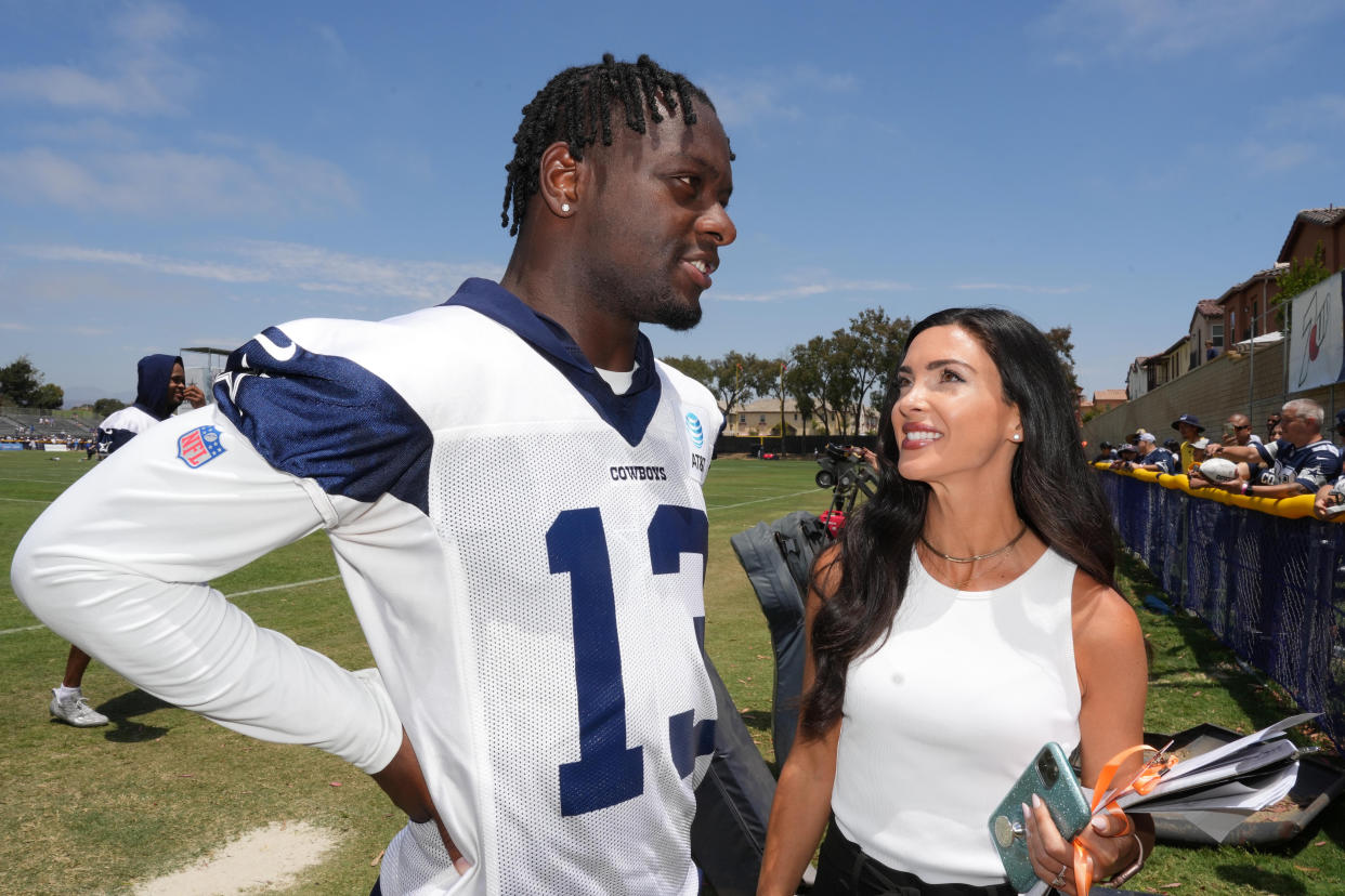 Jul 27, 2022; Oxnard, CA, USA; Dallas Cowboys receiver Michael Gallup (13) is interviewed by Sports Illustrated digital reporter Bri Amaranthus during training camp at the River Ridge Fields. Mandatory Credit: Kirby Lee-USA TODAY Sports