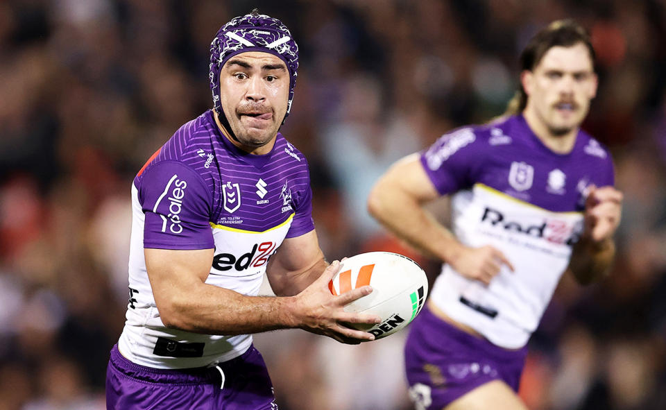 Jahrome Hughes in action for the Melbourne Storm.