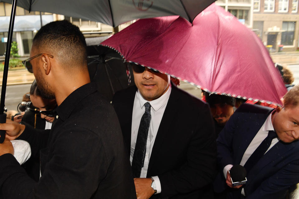 Jarryd Hayne arrives, surrounded by supporters, at Newcastle District Court on May 06, 2021.