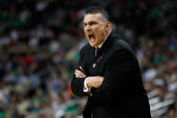 PITTSBURGH, PA - MARCH 17: Lead coach Frank Martin of the Kansas State Wildcats reacts as he coaches against the Syracuse Orange during the third round of the 2012 NCAA Men's Basketball Tournament at Consol Energy Center on March 17, 2012 in Pittsburgh, Pennsylvania. (Photo by Jared Wickerham/Getty Images)