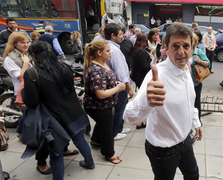 Sergio Massa, mayor of Buenos Aires' Tigre district and candidate for congress in the upcoming October 27 midterm elections, gestures during a campaign rally in Hurlingham October 23, 2013. REUTERS/Enrique Marcarian