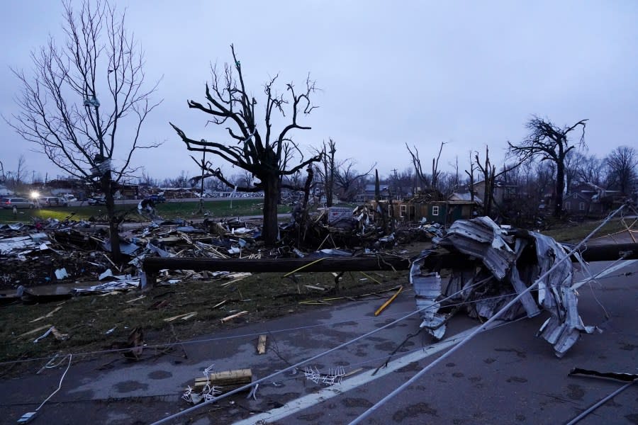 Debris from severe storms scatters the ground Friday, March 15, 2024, in Lakeview, Ohio. (AP Photo/Joshua A. Bickel)
