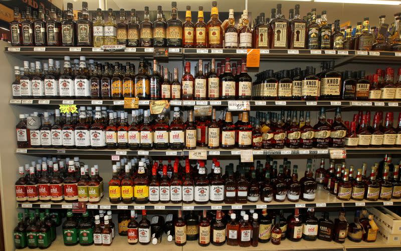 FILE PHOTO: A view of the many different types of Kentucky bourbon that are produced in Kentucky are displayed at a Party Mart liquor store in Louisville