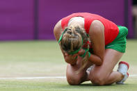 LONDON, ENGLAND - AUGUST 04: Victoria Azarenka of Belarus reacts after defeating Maria Kirilenko of Russia to win the bronze medal in the Women's Singles Tennis on Day 8 of the London 2012 Olympic Games at the All England Lawn Tennis and Croquet Club on August 4, 2012 in London, England. (Photo by Elsa/Getty Images)