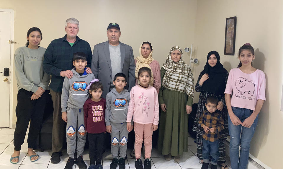 David Tyson with Mohammed Faqir Jawzjani and his family at their home in New Jersey (Courtesy Dr. Abdul Azim Rasul)