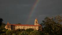 A rainbow is seen over the Union Buildings, where the body of former South African President Nelson Mandela was lying in state, in Pretoria December 12, 2013. Thousands of people lined up on Wednesday to say goodbye to Mandela, whose body lay in state in the building where the anti-apartheid hero was inaugurated in 1994 as South Africa's first black president. REUTERS/Thomas Mukoya (SOUTH AFRICA - Tags: OBITUARY POLITICS)