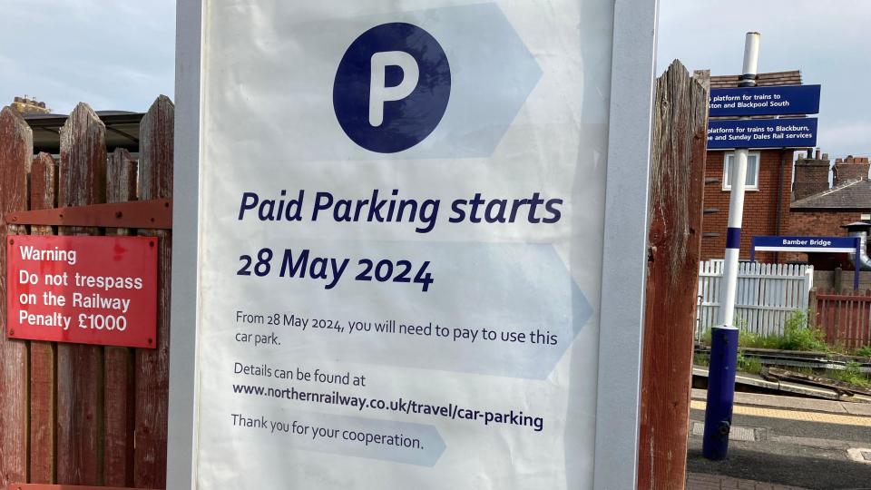 Sign saying parking charges will start at Northern stations on 28 May