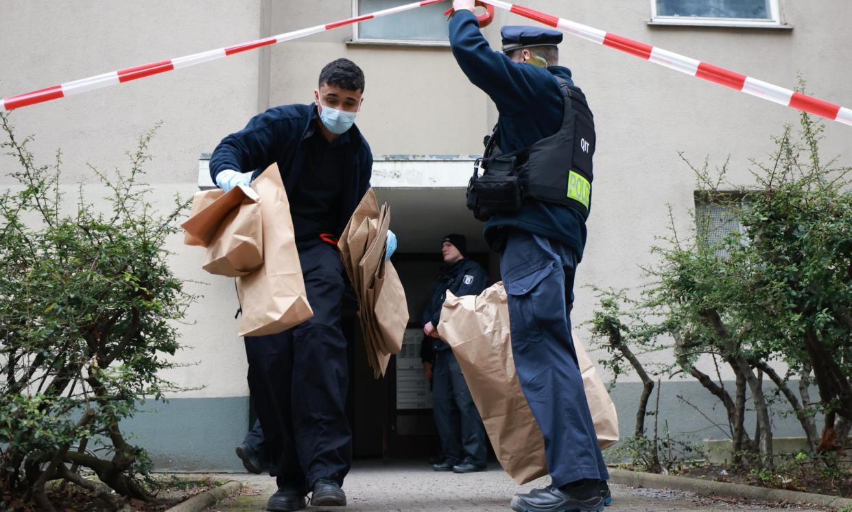<span>Residents were told to leave their homes as the police and fire brigade helped clear nearby buildings.</span><span>Photograph: Clemens Bilan/EPA</span>