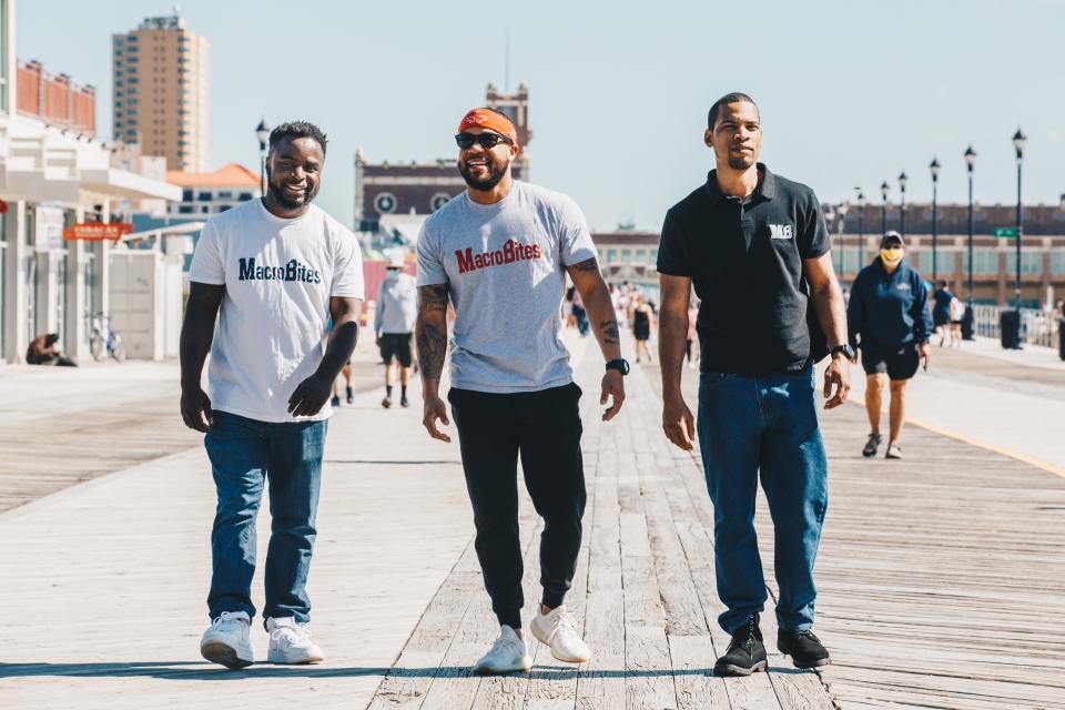 (Left to right) Fritz Georges, David Lewis Jr., and Jarrette Atkins on the Asbury Park boardwalk.