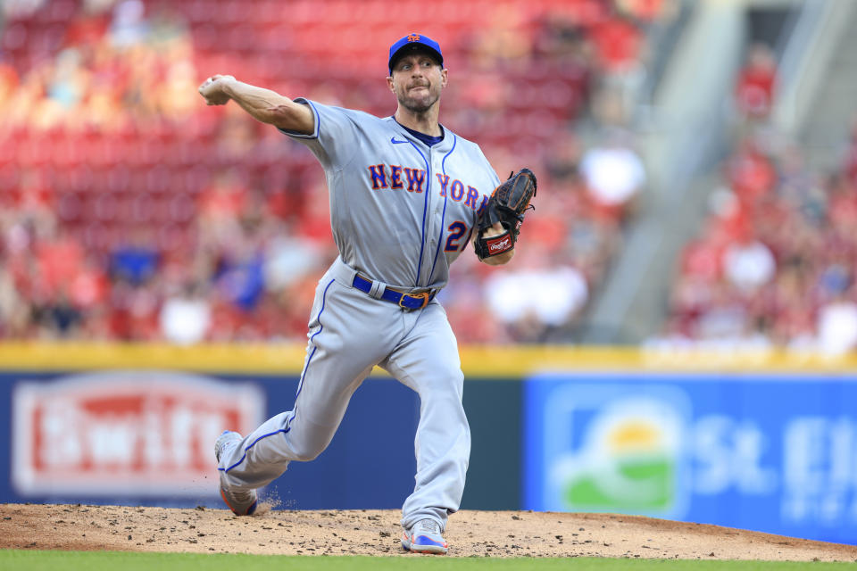 New York Mets' Max Scherzer throws during the first inning of the team's baseball game against the Cincinnati Reds in Cincinnati, Tuesday, July 5, 2022. (AP Photo/Aaron Doster)