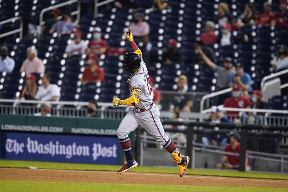 Atlanta Braves' Ronald Acuña Jr. runs the bases for his solo home run during the fifth inning of baseball game against the Washington Nationals at Nationals Park, Tuesday, May 4, 2021, in Washington. (AP Photo/Alex Brandon)