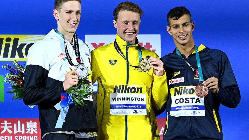 Elijah Winnington hovered at world record pace on his way to victory in the 400m freestyle at the FINA World Championships. (Photo by Quinn Rooney/Getty Images)