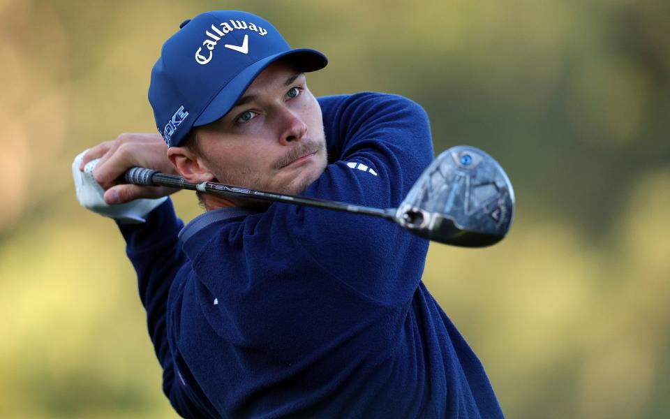 Nicolai Hojgaard playing his tee shot on the 18th