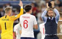 <p>Gareth Southgate, Harry Maguire and Jordan Pickford applaud the Three Lions fans who saw them play </p>