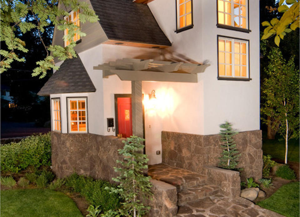 <body> <p>Who would guess that this small storybook guesthouse from Homeland Design fits not one but two floors inside its diminutive dimensions. The <a rel="nofollow noopener" href=" http://www.bobvila.com/slideshow/7-thrifty-designs-for-a-diy-walkway-48856?bv=yahoo" target="_blank" data-ylk="slk:flagstone pathway;elm:context_link;itc:0;sec:content-canvas" class="link ">flagstone pathway</a> leading up to the stucco-covered abode looks like it came straight out of a fairy tale. Plus, the ample windows, set aglow by the interior lights, make this home look absolutely magical.</p> <p><strong>Related: <a rel="nofollow noopener" href=" http://www.bobvila.com/slideshow/9-kits-for-an-instant-kids-clubhouse-49106#.WD-orqIrKRs?bv=yahoo" target="_blank" data-ylk="slk:9 Kits for an Instant Kids' Clubhouse;elm:context_link;itc:0;sec:content-canvas" class="link ">9 Kits for an Instant Kids' Clubhouse</a> </strong> </p> </body>