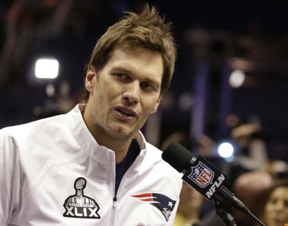 Patriots QB Tom Brady answers a question during media day for NFL Super Bowl XLIX. (AP)