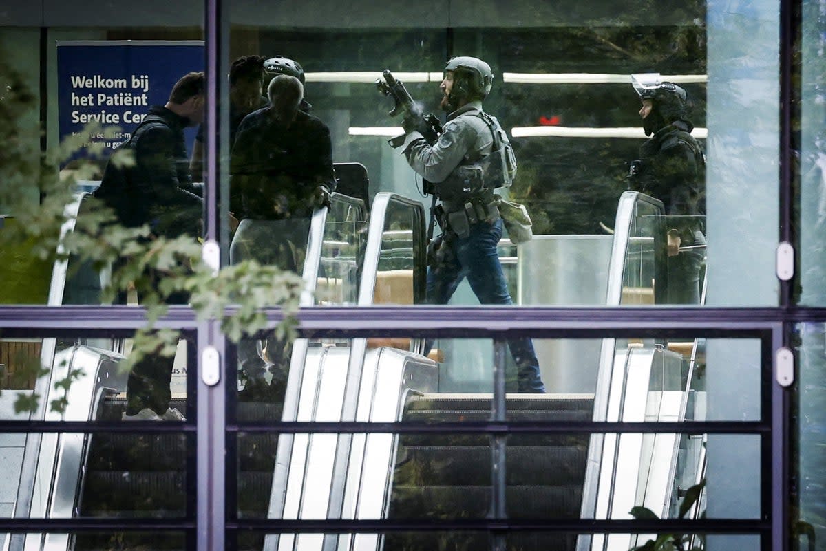 Dutch police secure the Erasmus University medical centre on Thursday afternoon  (ANP/AFP via Getty Images)