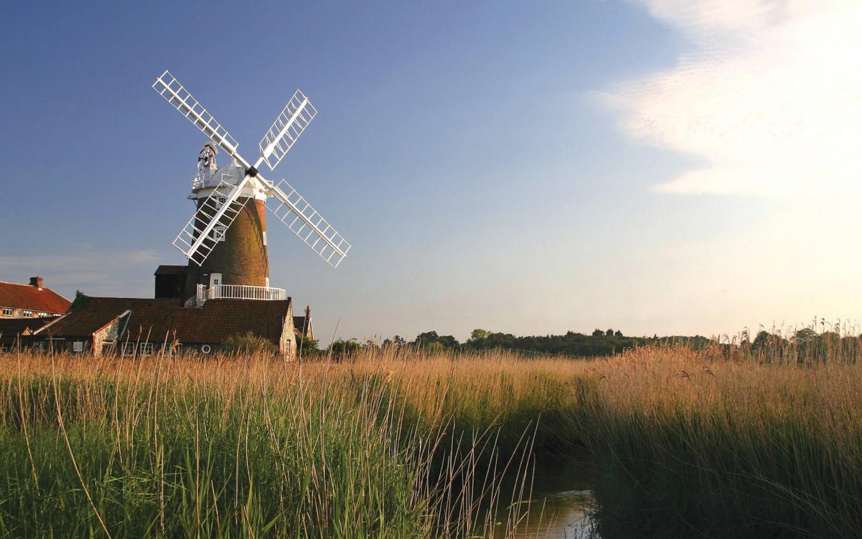 Cley Windmill is a 19th-century mill on the edge of protected reed beds and salt marshes 