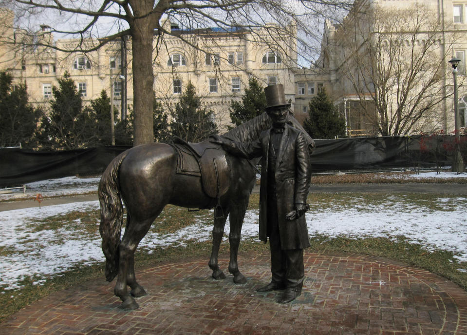 This Jan. 27, 2012 image shows a statue of President Lincoln on his horse outside President Lincoln’s Cottage, a historic site in Washington D.C. Lincoln summered here with his family and often commuted a half-hour on horseback to the White House each day. The cottage is one of a number of Lincoln sites that can be visited in Washington, D.C. (AP Photo/Beth J. Harpaz)