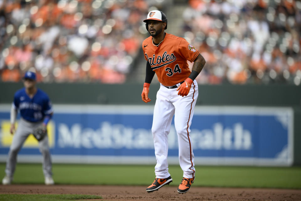 Baltimore Orioles' Aaron Hicks (34) takes a lead from first base during the first inning of a baseball game against the Kansas City Royals, Saturday, June 10, 2023, in Baltimore. (AP Photo/Nick Wass)