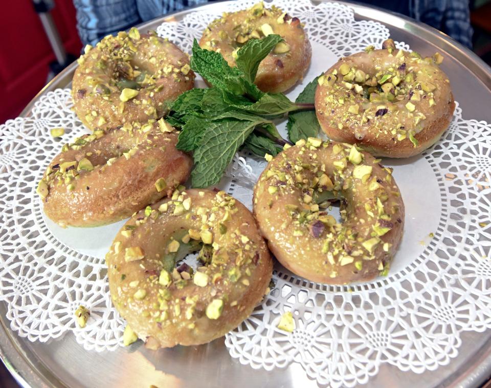 Pistachio doughnuts, one of the things Fig Tree Cafe owner Maria Ferguson kept from the restaurant's time as The Mills, are more healthful because they are baked not fried.