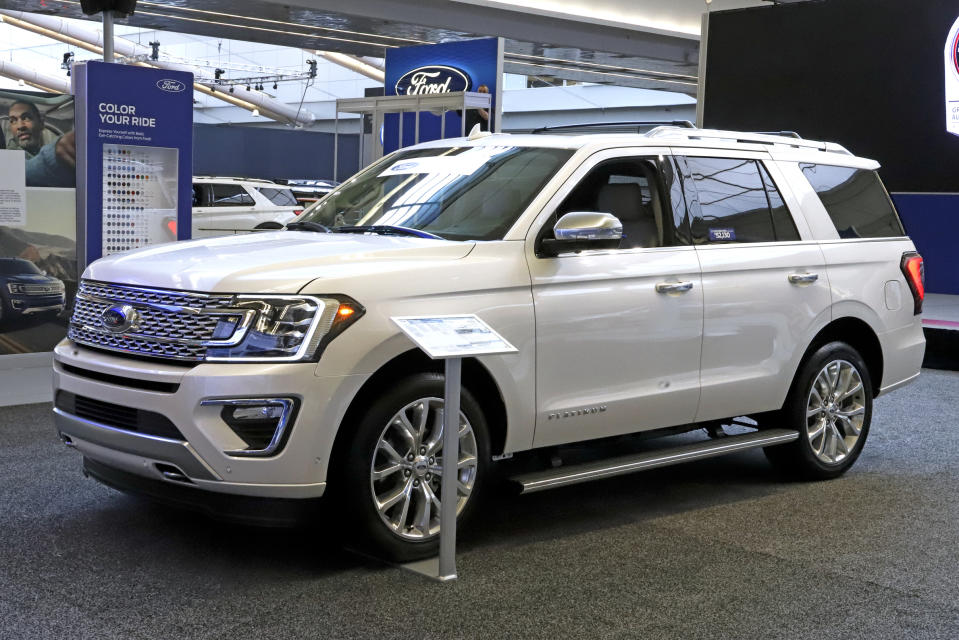 FILE- This Feb. 14, 2019, file photo shows a 2019 Ford Expedition 4x4 on display at the 2019 Pittsburgh International Auto Show in Pittsburgh. Ford Motor Co. said Tuesday, March 19, it will shift 550 jobs to its Kentucky Truck Plant to boost production of its Expedition and Lincoln Navigator to meet growing demand for its large SUVs. (AP Photo/Gene J. Puskar, File)