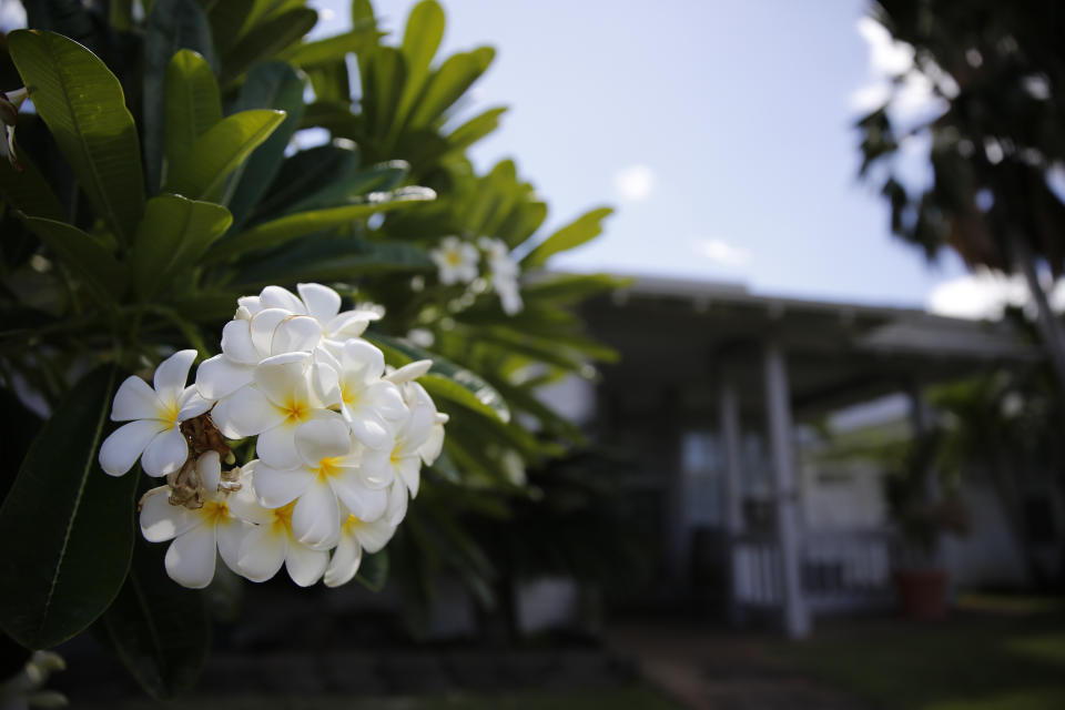 The home where U.S. defense contractor Walter Glenn Primrose and his wife, Gwynn Darlle Morrison, lived for years allegedly under aliases is pictured, Wednesday, July 27, 2022, in Kapolei, Hawaii. They have been charged with identity theft and conspiring against the government after prosecutors allege they stole the identities of dead Texas children decades ago. (AP Photo/Caleb Jones)