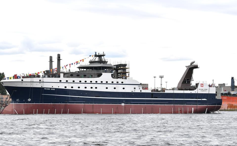 This photo provided by the Kremlin shows the Mekanik Sizov, a super trawler belonging to a company partly owned by sanctioned businessman Gleb Frank. A U.S. ban on seafood imports from Russia over its invasion of Ukraine was supposed to sap billions of dollars from Vladimir Putin’s war machine. But shortcomings in import regulations means that Russian-caught pollock, salmon and crab are likely to enter the U.S. anyway, by way of the country vital to seafood supply chains across the world: China. (The Kremlin via AP)