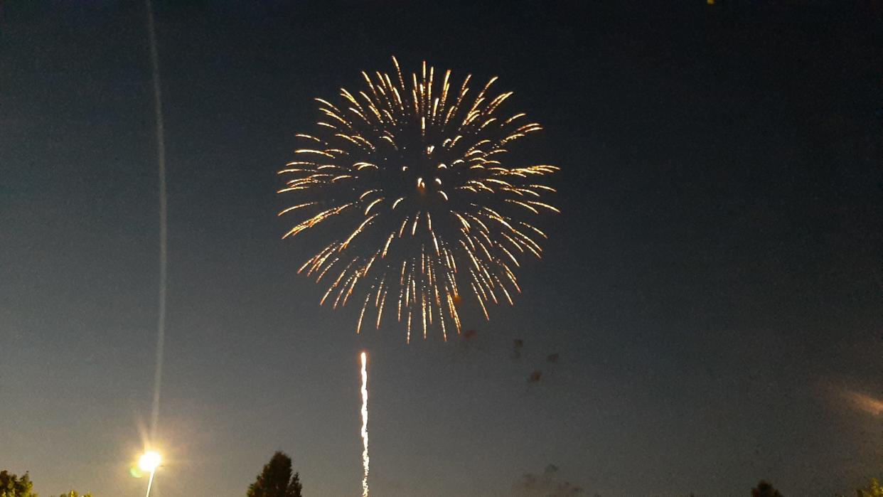 Fireworks bloom from Vince Grady Field at Western Illinois University July 4, 2022.