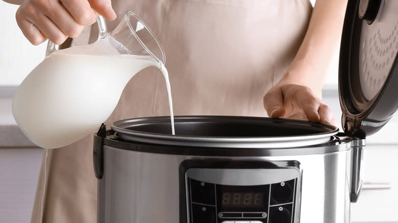 pouring milk cooker