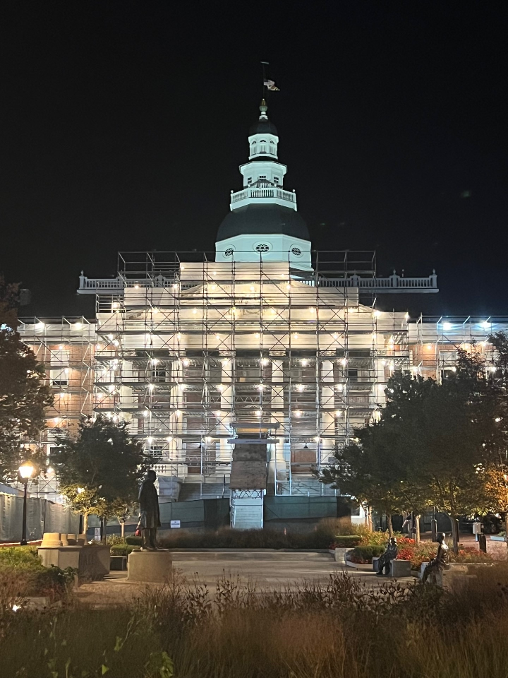 The Maryland State House pictured at night with scaffolding on October 29, 2023. Renovations to the historic building have proceeded for months.