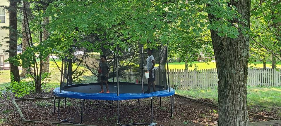 Tracey Marshall-Underwood bought a trampoline for her children instead of going on summer vacation.
