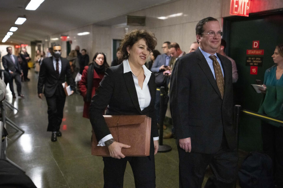 New York executive assistant district attorney Susan Hoffinger. center, and assistant district attorney Joshua Steinglass, right, arrive to a courtroom as the Trump Organization's former Chief Financial Officer Allen Weisselberg is due for sentencing, Tuesday, Jan. 10, 2023, in New York. The longtime Donald Trump lieutenant who became a star prosecution witness and helped convict the former president's company of tax fraud is set to be sentenced for dodging taxes on $1.7 million in company-paid perks. (AP Photo/John Minchillo)