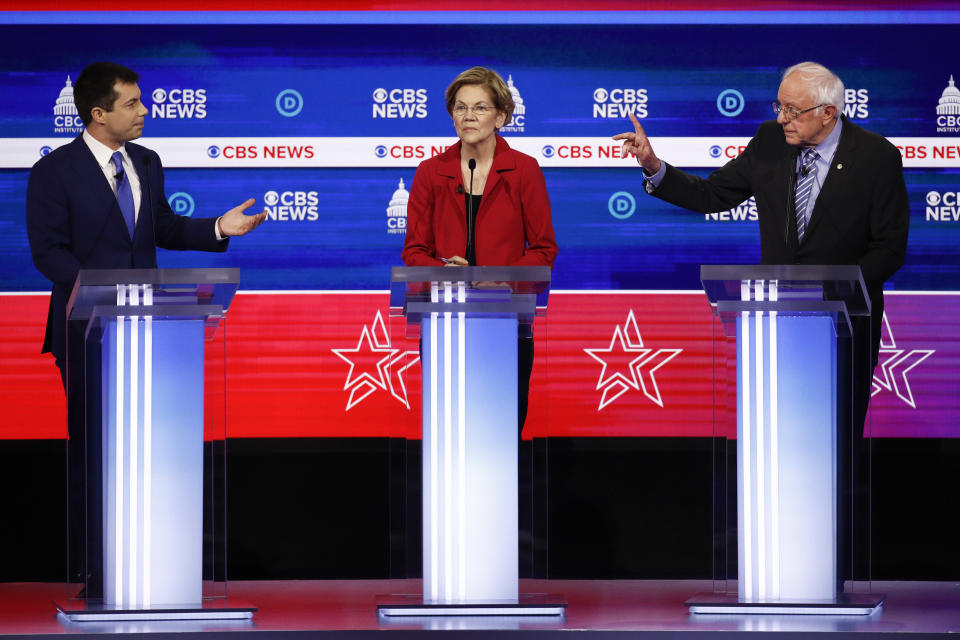 From left, Democratic presidential candidates, former South Bend Mayor Pete Buttigieg, Sen. Elizabeth Warren, D-Mass., and Sen. Bernie Sanders, I-Vt., participate in a Democratic presidential primary debate at the Gaillard Center, Tuesday, Feb. 25, 2020, in Charleston, S.C., co-hosted by CBS News and the Congressional Black Caucus Institute. (AP Photo/Patrick Semansky)
