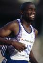 <p>Sprinter Derek Redmond withdrew from the 1988 Games due to injury, and was more determined than ever to compete in the 1992 Barcelona Games. Devastatingly, he tore his hamstring mid-race, but his finish was still the most memorable. His father, Jim Redmond, rushed onto the track, and arm in arm, helped his son complete the race in what would be one of the most inspirational Olympic moments ever. (Getty) </p>