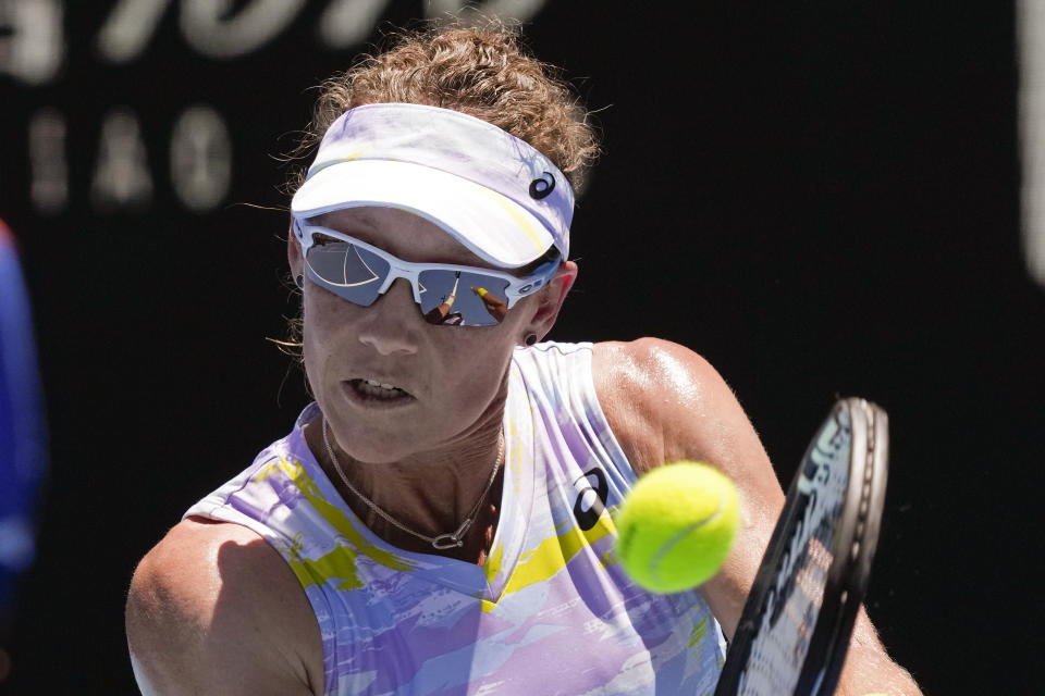 Samantha Stosur of Australia plays a backhand return to Anastasia Pavlyuchenkova of Russia during their second round match at the Australian Open tennis championships in Melbourne, Australia, Thursday, Jan. 20, 2022. (AP Photo/Simon Baker)