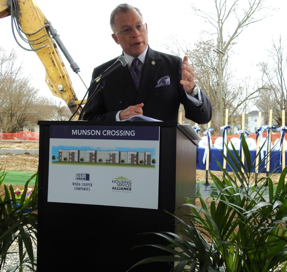 Mayor Don Mason speaks at a groundbreaking ceremony for the new Munson Crossing housing complex being built by Woda Cooper Companies.