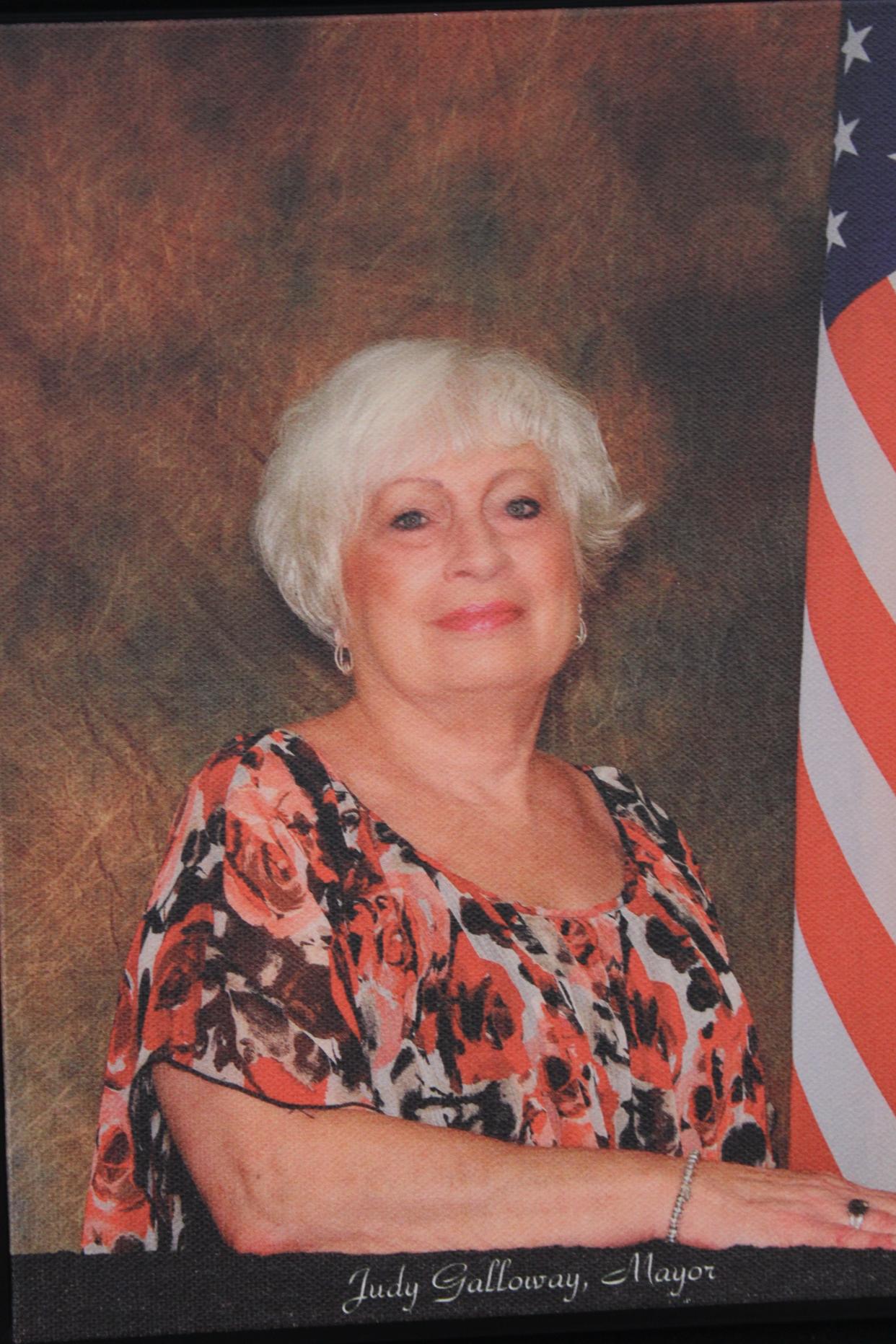 A portrait of former Varnamtown Mayor Judy Galloway hangs on the wall inside the Varnamtown Town Hall. At her retirement, Galloway was recognized as the longest-serving mayor of any municipality in North Carolina with 31 consecutive years of service.