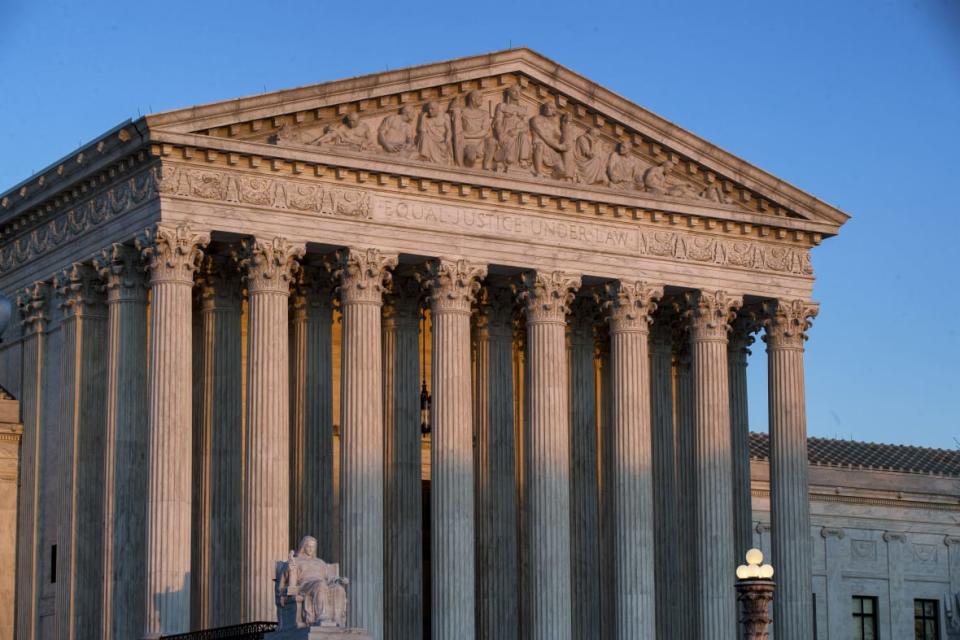 The U.S. Supreme Court is seen at sunset, March 27, 2019, in Washington. Dance Laboratories is asking the Supreme Court to preserve access to its abortion pill free from restrictions imposed by lower court rulings, while a legal fight continues. (AP Photo/Alex Brandon)