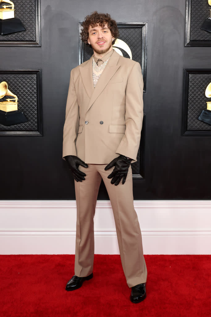 Jack Harlow in beige double-breasted suit.